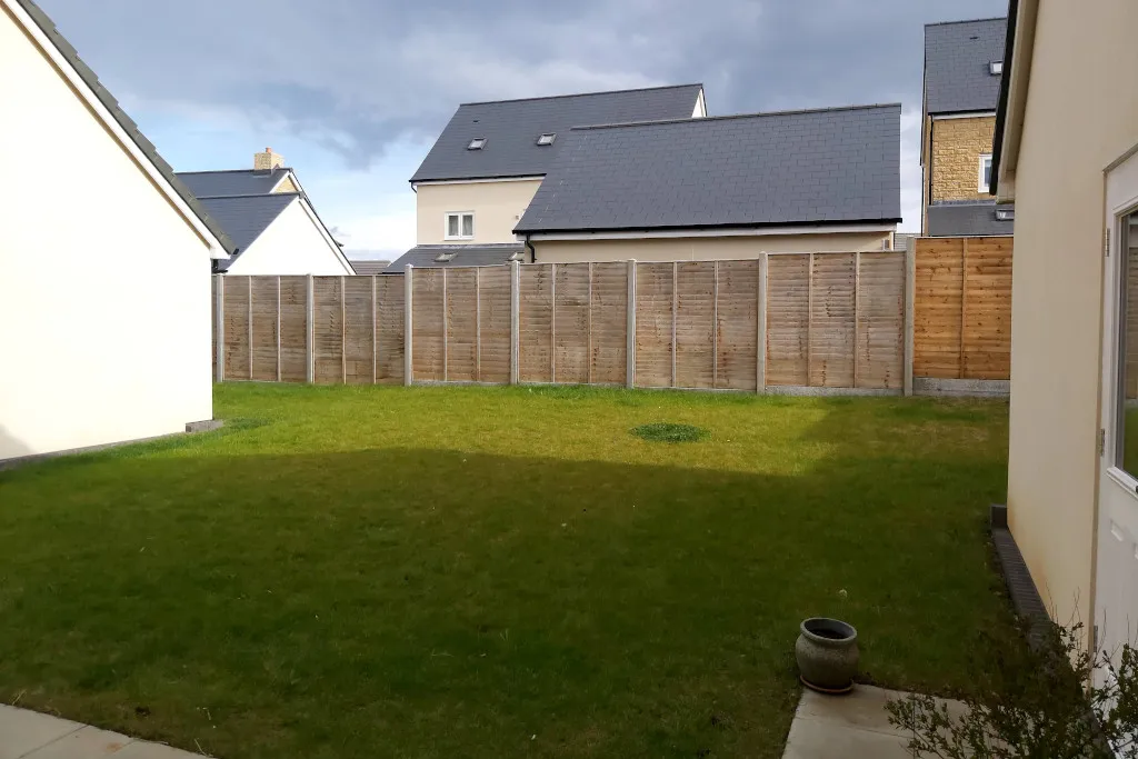 Before The garden before transformation. The whole garden is turfed with no beds or other features.