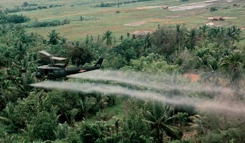 Figure 4: US helicopter covers rainforest with Agent Orange during the Vietnam War
